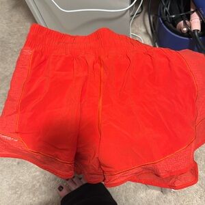 Lululemon red orange Speed Up Shorts size 8